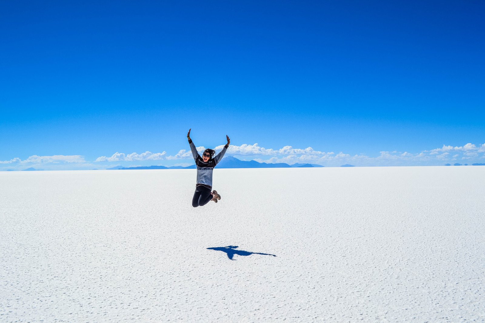 Bolivia Salar de Uyuni 2026 travel guide with white salt flats and mirror sky reflections